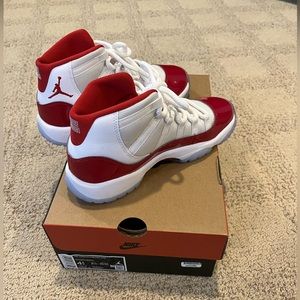 Air Jordan 11 Retro GS in “cherry”. Youth size 4.5. BRAND NEW NEVER WORN